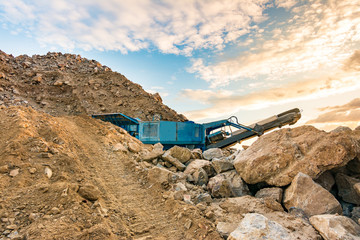 Wall Mural - Stone crushing machine in a quarry or outdoor mine