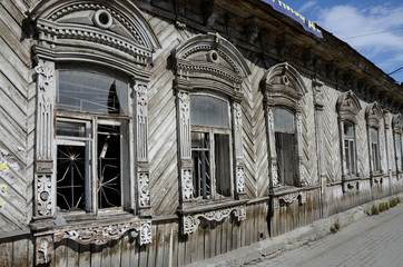 Wall Mural - Window in an old wooden building in Chelyabinsk, Russia.