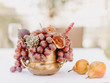 Wedding decor with grape, pear, fig and succulent. Boho style. Fine art photography