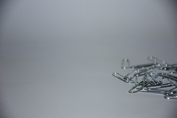 Set of metal gray paperclips