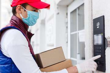 Sticker - Grocery delivery man wearing medical gloves and face mask. Online shopping and delivery for grocerys, wine and food. Self Quarantine during coronavirus pandemic. Food delivery service courier