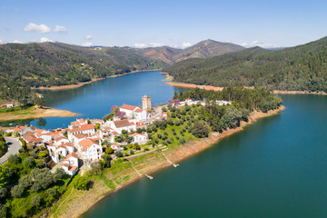 Wall Mural - Dornes drone aerial view of city and landscape with river Zezere in Portugal