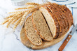 Wholegrain rye bread with glasses of milk