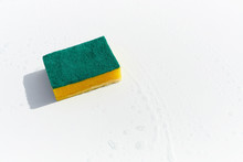 Close Up Of Yellow Sponge With Soap