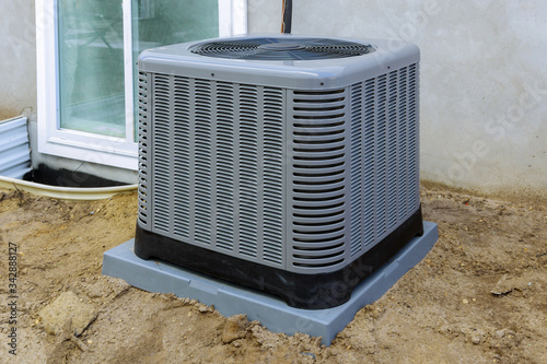Cuadros en Lienzo Air conditioning system outside installation on of the house.