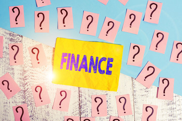 Poster - Writing note showing Finance. Business concept for Management of large government companies money amount Provide funds Scribbled and crumbling papers with thick cardboard above wooden table
