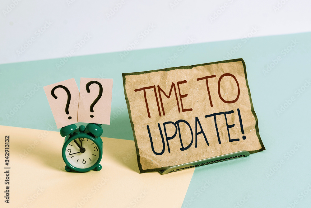 To Be Updated Note Writing note showing Time To Update. Business concept for the act of ...
