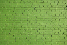 Green Brick Wall Texture.  Background From Bricks Painted With Green Paint.