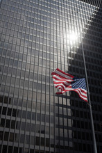 Low Angle View Of American Flag Outside Willis Tower