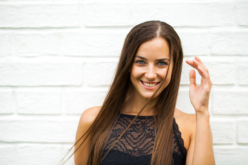 Closeup portrait of a happy young woman smiling