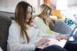 © Haydiddle - two girls working on laptop for high school at home