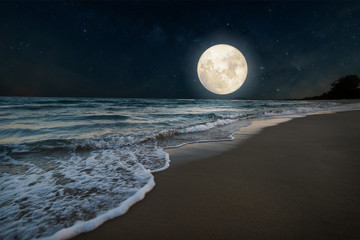 beautiful nature fantasy - romantic beach and full moon with star. retro style with vintage color to