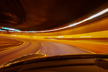 Blurred Motion Of Illuminated Lights In Tunnel