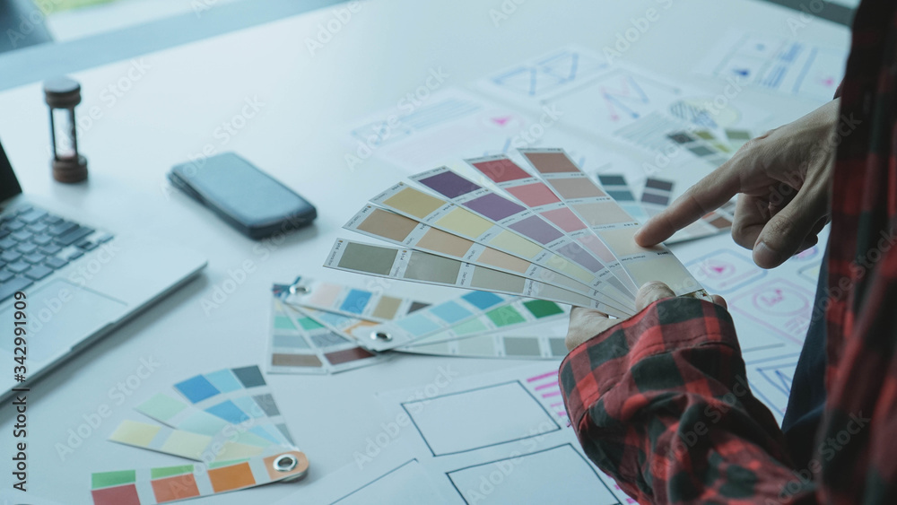 Designers man drawing ui/ux designers working and designing user ...