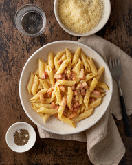 Wall Mural - Carbonara pasta. Penne with pancetta, egg, parmesan cheese and cream sauce