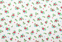 Beautiful Calico Texture With Embroidered Flowers On A Calm Plain Background