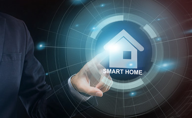 Poster - Internet of things. Unrecognizable businessman pressing shiny SMART HOME icon on transparent screen, collage
