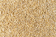 © piotrszczepanek - Kasza jęczmienna rozsypana na całej powieżchni, zbliżenie makro