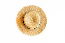 Flat Lay Of Straw Hat Isolated On White Background. Top View