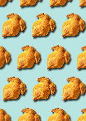 Wall Mural - colorful pattern of roasted chicken or turkey on blue background. top view. creative design for pack