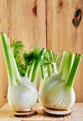 Poster - Fresh organic fennel bulbs on a wooden background