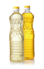 Plastic bottles of refined and  unrefined vegetable oil