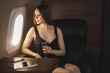 © liliyabatyrova - Attractive woman in private jet