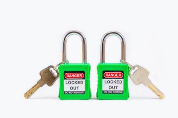 Wall Mural - Green key lock and tag for process cut off electrical,the toggle tags number for electrical log out tag out on white background