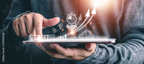 Fotomural Startup concept with icon business and network connection on modern virtual interface from digital tablet