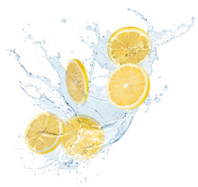 Lemon Slices In Water Splash Isolated On A White Background