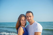 © blicsejo - Young happy couple on seashore