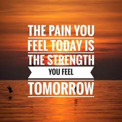 Wall Mural - Motivational Quote on sunset background - The pain you feel today is the strength you feel tomorrow.