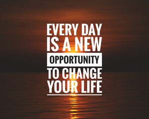 Wall Mural - Motivational Quote on sunset background - Every day is a new opportunity to change your life.