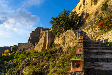 Wall Mural - Scenic view at sunset of Arechi Castle, one of the ancient buildings of Salerno, Campania, Italy