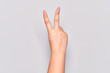 © Krakenimages.com - Hand of caucasian young woman counting number 2 showing two fingers, gesturing victory and winner symbol