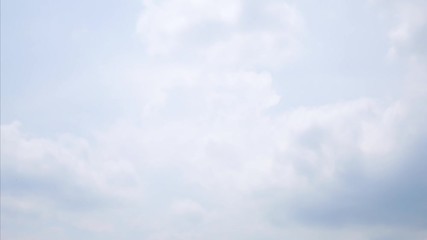 Wall Mural - 4k time lapse video blue sky with fluffy white clouds moving during the day time