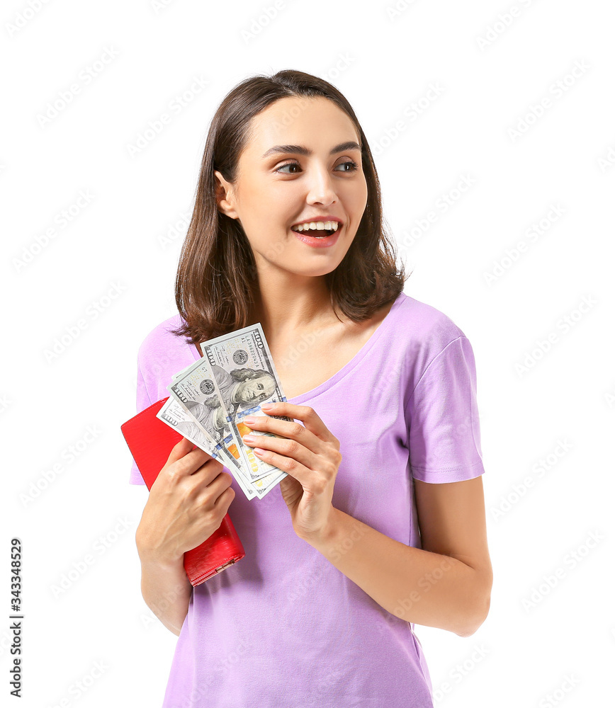 Young woman with wallet and money on white background