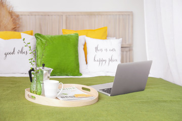 Wall Mural - Tray with coffee and laptop on bed