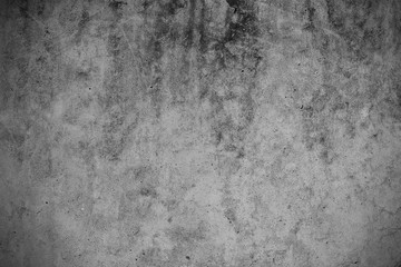 White concrete wall with black stains as background