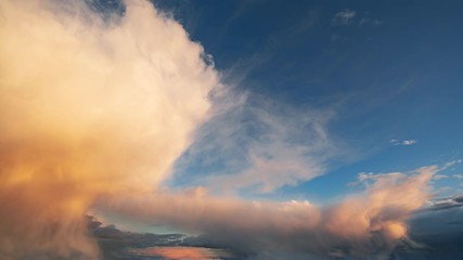Wall Mural - amazing timelapse of bright sunset clouds moving over the sky. beautiful orange and yellow colors gr