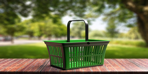 Wall Mural - Shopping basket against green nature background. Shopping bio groceries concept. 3d illustration