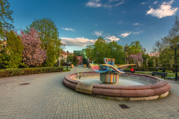 Wall Mural - Spring view of city Opole in Silesia in Poland. Historical old town in gold light.