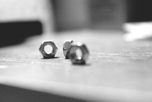 Close-up Of Bolts On Table