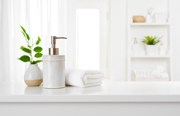 Wall Mural - soap dispenser and spa towel on pastel bathroom window interior