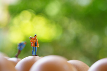 Wall Mural - Miniature 2 people stand on The walkway the beginning of the journey To reach the goal. using as background  travel concept with copy spaces for your