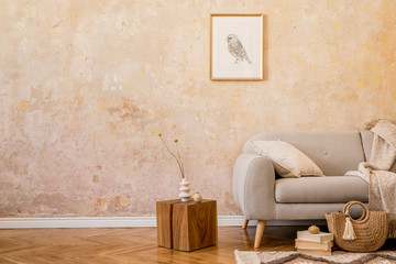 Wall Mural - stylish concept of living room interior with design grey sofa, mock up picture frame, dried flower, 