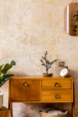 Wall Mural - retro composition of living room interior with wooden vintage commode, gold pink mirror, plant, ratt