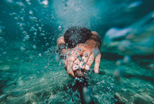 A Man Swims Under Water.