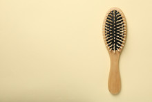 Hair Brush On Beige Background, Space For Text