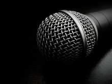 Close-up Of Microphone On Table